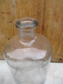Beautiful old brocante bottle in clear glass