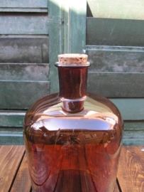 Old brown bottle of 5 liters