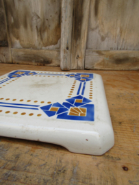 Art deco aardewerk onderzetter