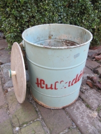 Old green bin with lid