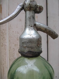 Antieke spuitfles in groen