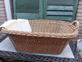 Ancient big wicker basket with one ear