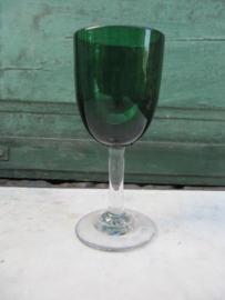 Green glass on foot