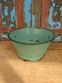 Old green enamel colander