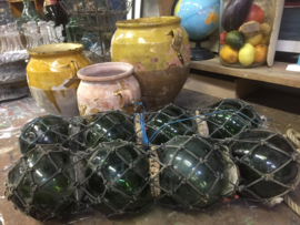 Antique French glass floats in net