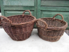 Cute old cane harvesting and wood baskets.