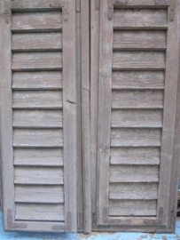 Antieke set houten luiken in blauw.