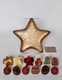Metalen ster gevuld met kerstbonbons