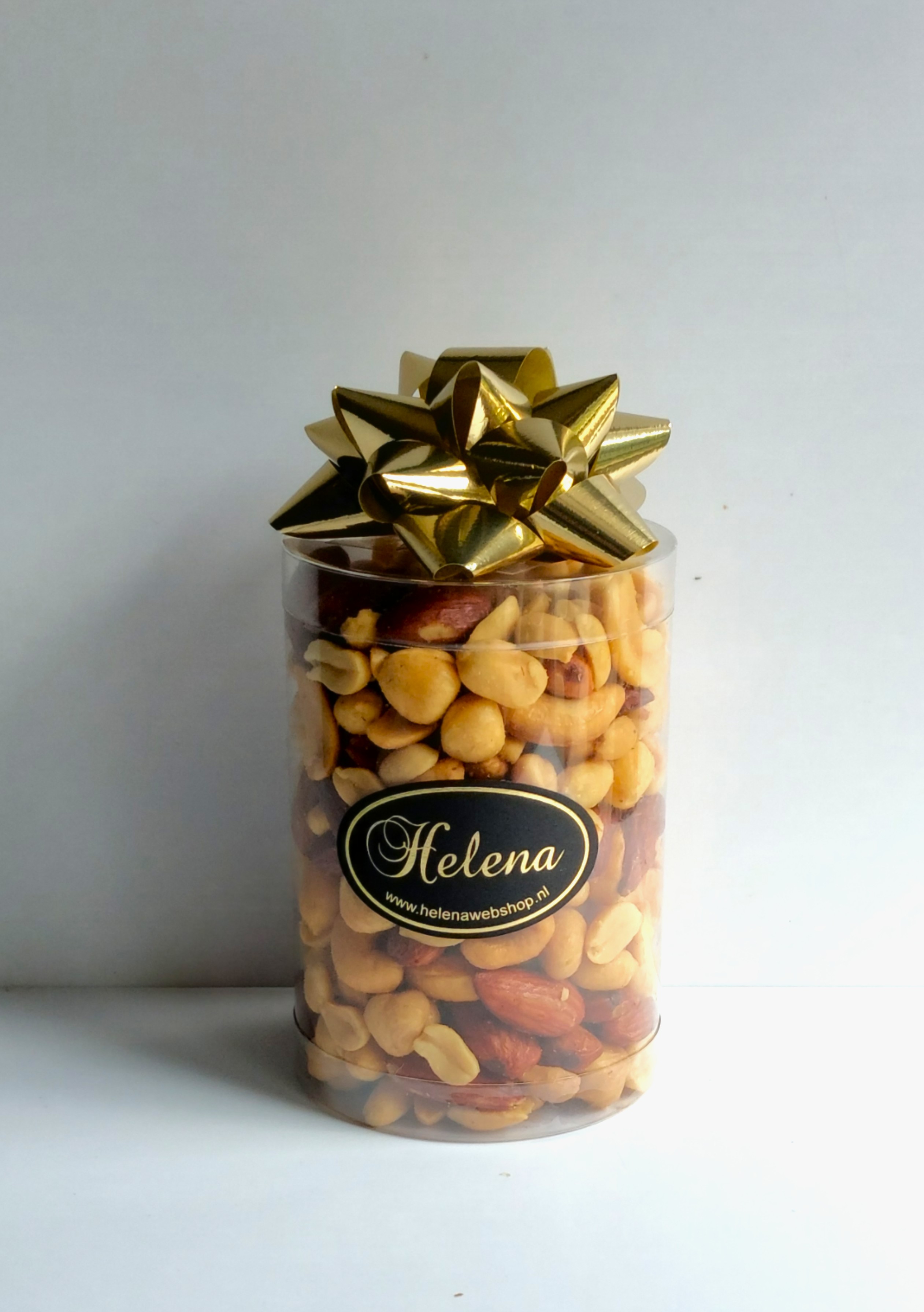 Notenkoker 10 cm , gevuld met notenmix