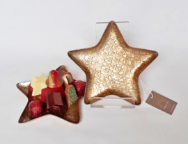 Metalen ster gevuld met kerstbonbons