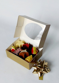 Kerstchocolade in vensterdoos met strik, 250 gram