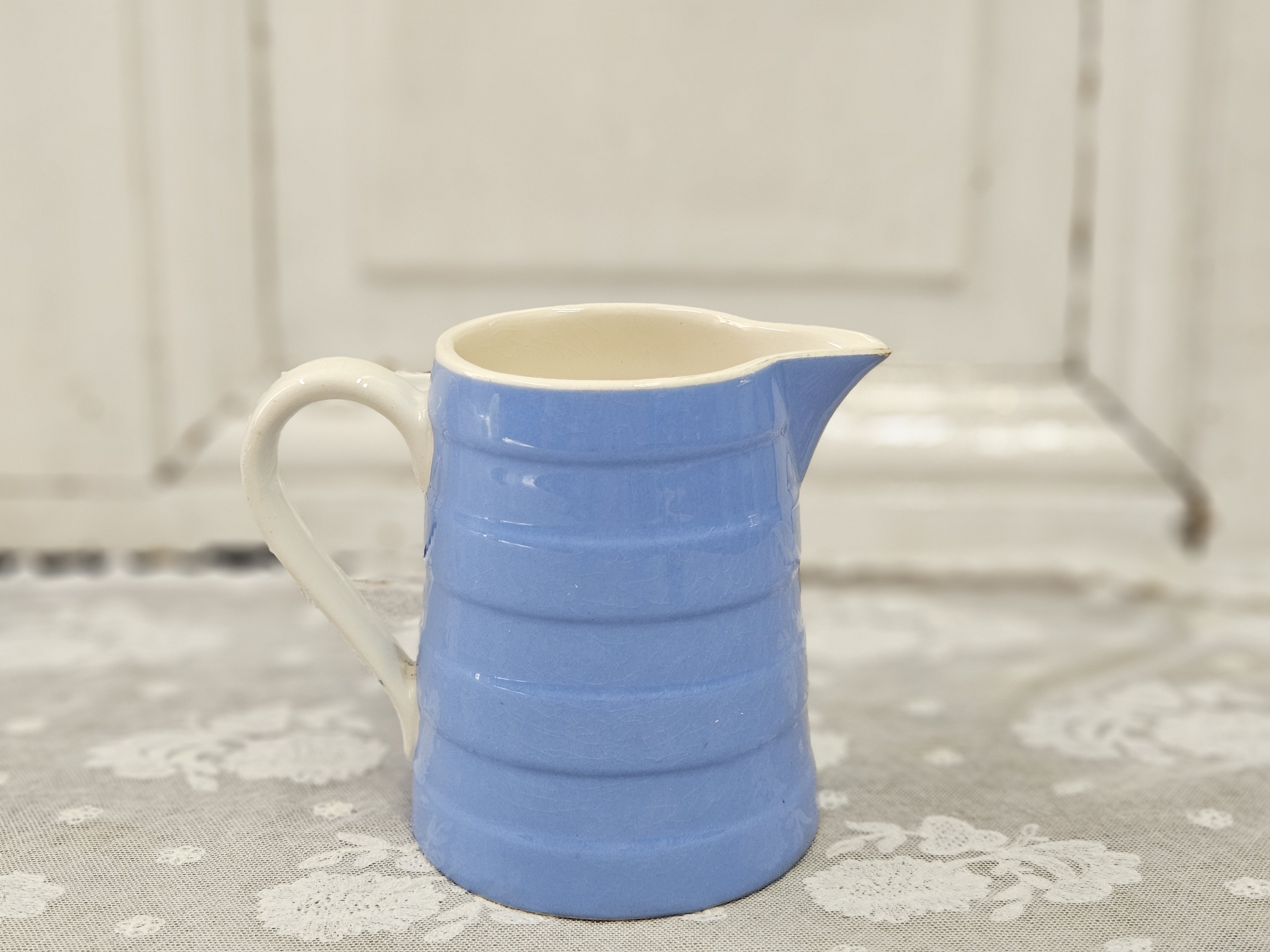 Blauw bandenkannetje
