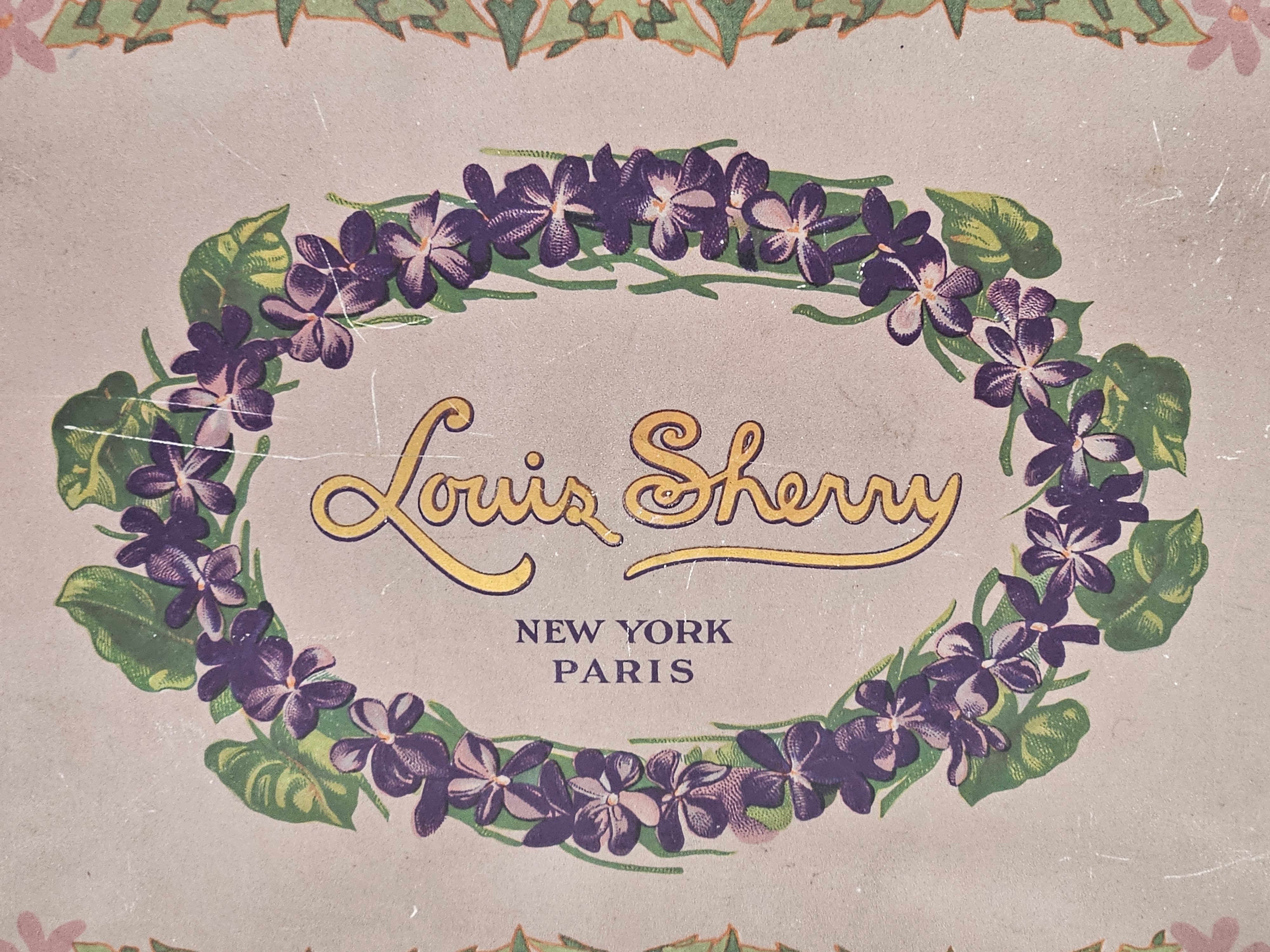 Blik met viooltjes Louis Sherry