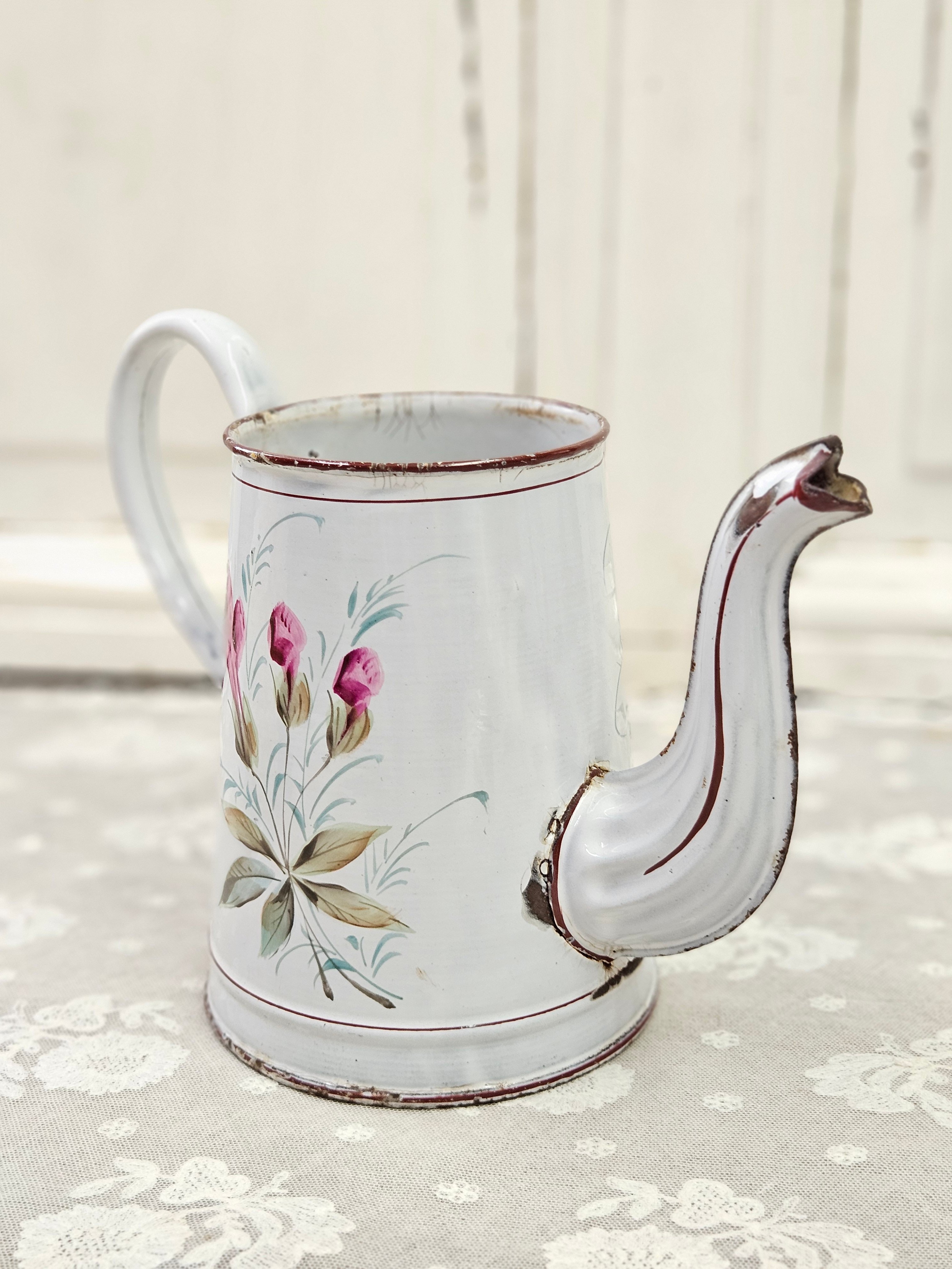 Koffiepotje met roze bloemen