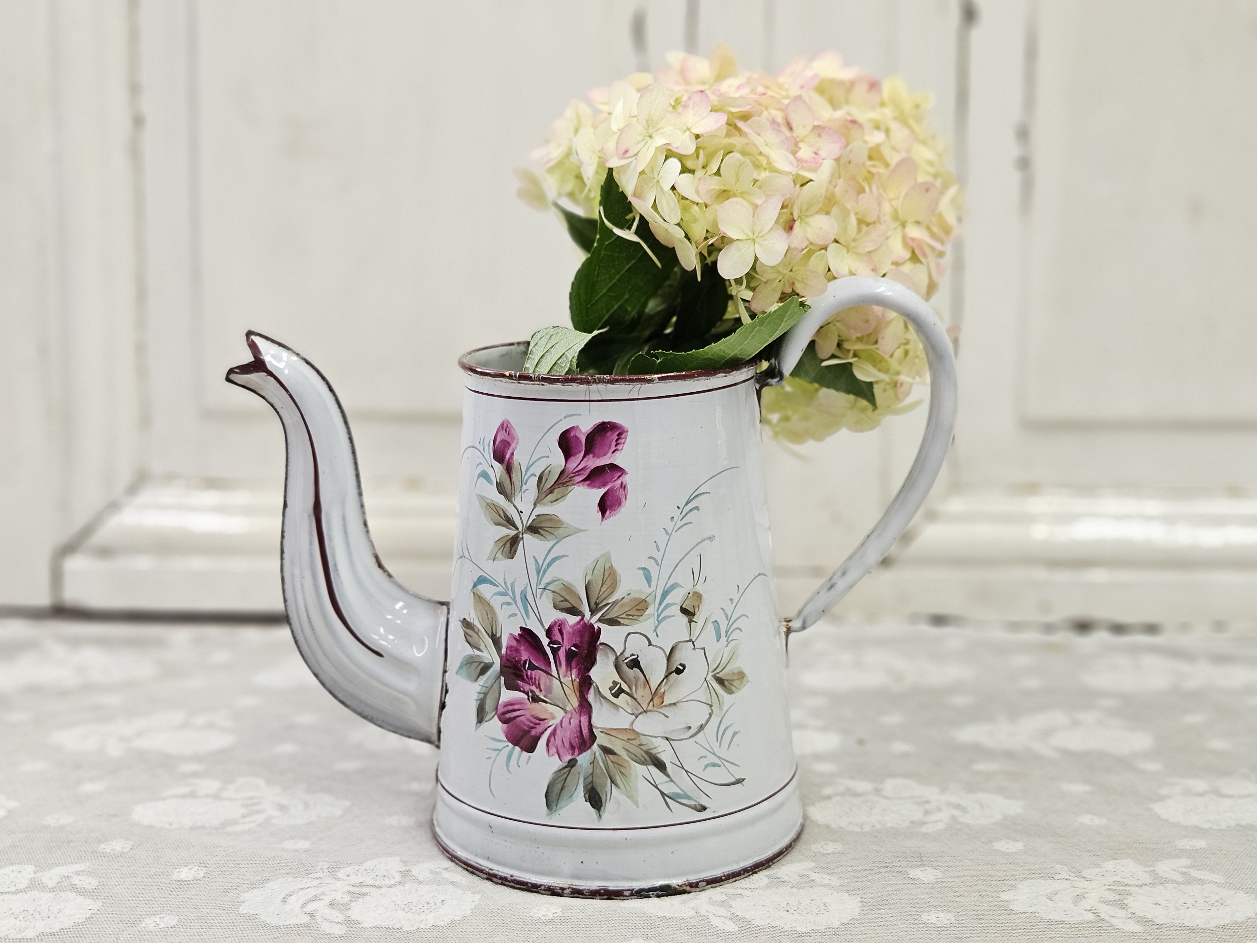Koffiepotje met roze bloemen