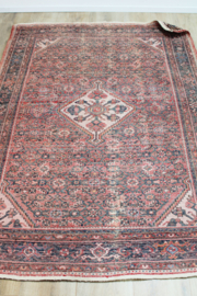 Handgeknoopt Oosters kleed rozig/rood. Uniek vintage tapijt