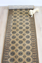 Bruine vintage loper met Oosters decor. Lang wollen Boho tapijt / kleed