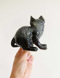 Schattig vintage poezen beeldje. Retro beeld van een poes