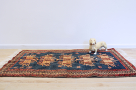Uniek vintage tapijt. Handgeknoopt Oosters kleedje blauw/oranje