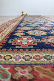 Lange vintage loper met Oosters decor. Wollen Boho tapijt / kleed