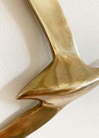 Set goudkleurige vogels. Vintage messing zwaluwen voor aan de muur