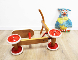 Houten vintage loopfiets van Rolli. Retro kinder fiets / speelgoed