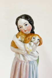 Set van 2 beeldjes van kinderen met hondjes.  Keramieken vintage ornamenten
