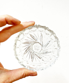 Set vintage onderzettertjes van glas in houder. 11 glazen onderzetters