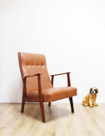 Bruine vintage fauteuil met armleuningen. Mid Century design stoel