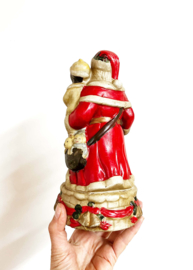 Vintage kerstmannen beeldje met kinderen. Keramieken retro Santa Clause