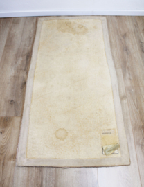 Handgemaakt vintage tapijt. Oosters vloerkleed in pasteltinten