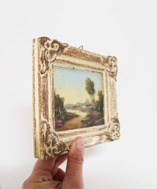 Klein schilderijtje van een heide landschap. Olieverf schilderij in barok lijst