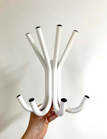Witte vintage kapstok. Retro design wandkapstok