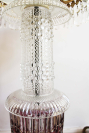 Glazen boudoir bijzettafeltje met gouden details. Vintage plantentafel