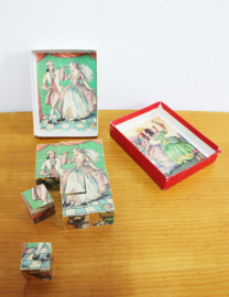Vintage puzzel: Assepoester. Retro blokken / blokpuzzel in doos