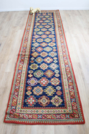 Lange vintage loper met Oosters decor. Wollen Boho tapijt / kleed