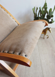 Vintage voetenbankje met beige rib bekleding. Houten retro schommelbankje