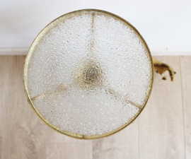 Glazen boudoir bijzettafeltje met gouden details. Vintage plantentafel