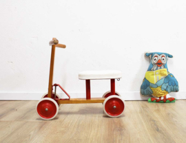 Houten vintage loopfiets van Rolli. Retro kinder fiets / speelgoed