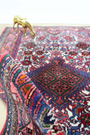 Kleurrijk handgemaakt vloerkleed. Roze vintage tapijtje / deur / badmat