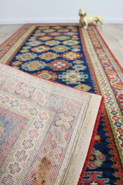 Vintage loper met Oosters decor. Lang Boho tapijt / kleed met bloemen