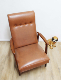 Bruine vintage fauteuil met armleuningen. Mid Century design stoel