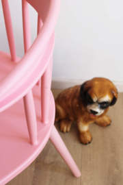 Roze kunststof spijlenstoel / tuinstoel