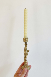Goudkleurige kandelaar met muzikant. Vintage kandelaartje messing/brons?