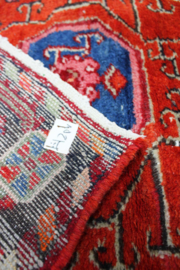 Authentiek handgemaakt Oosters vloerkleed. Kleurrijk vintage tapijt