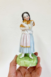 Set van 2 beeldjes van kinderen met hondjes.  Keramieken vintage ornamenten