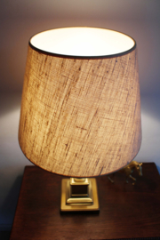 Goudkleurige tafellamp met beiga kap. Vintage Herda lamp
