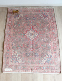 Handgeknoopt vintage tapijt met bloemen. Oosters Boho vloerkleed, verkleurd