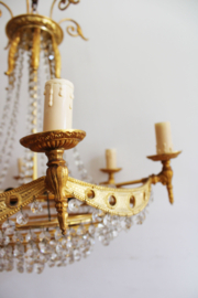 Schitterende vintage kroonluchter met pegels. Hollywood Regency hanglamp