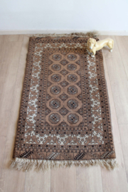 Bruin handgemaakt kleedje. Vintage Oosters tapijt.